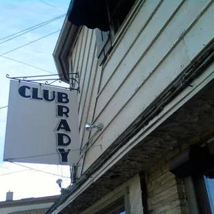 a sign on the side of a building