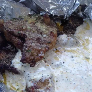 Lamb chops in club celebrity sauce, Parmesan sauce and spices. Naughty good.