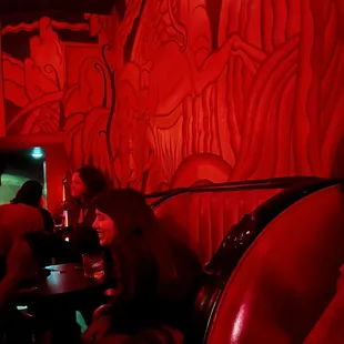 a group of people sitting around a table