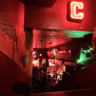 a bar with a neon sign