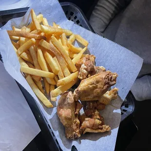Chicken wings and fries