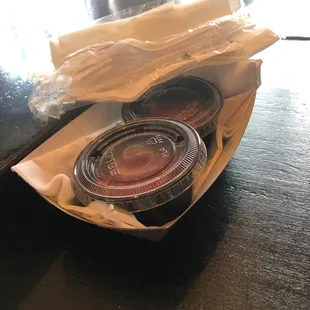 Portioned out ketchup and napkins for covid era distanced dining