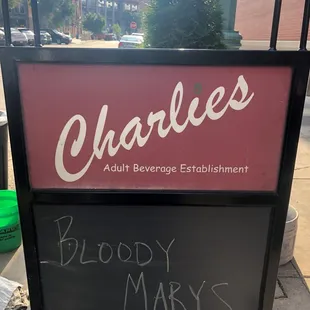 Board sign posted out front of the establishment