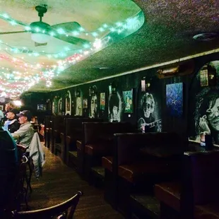a group of people sitting at a bar