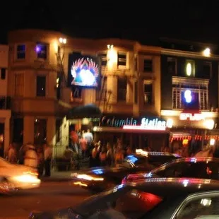 a busy street at night