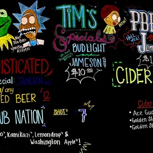 a chalkboard with a variety of signs
