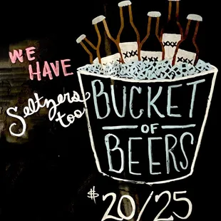 a bucket of beer with a bunch of sprinkles in it