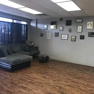 a living room with wood flooring