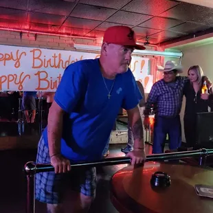 a man playing a game of pool
