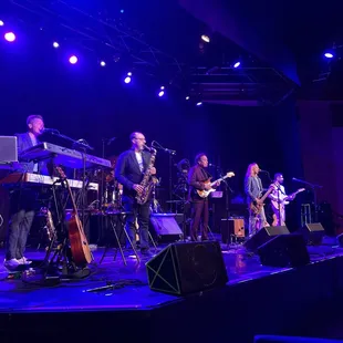 a group of musicians on stage