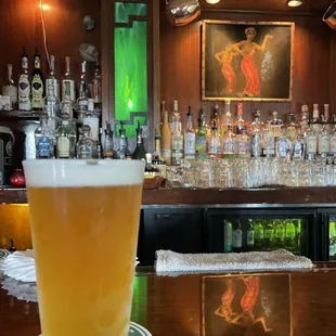 a pint of beer on the bar