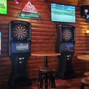 Arcade game, dart boards and tvs