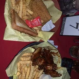 Chicken wings w/fries,fried catfish!! Omg, service was Excellent!!! I would come back for the service and food. Hold up! live band,