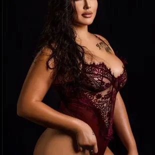 a woman in a red lingerie