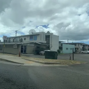 a view of a motel from across the street