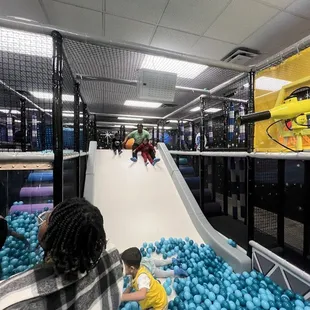 Sliding into the ball pit fun