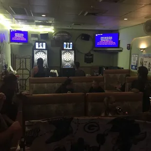 a group of people sitting in a restaurant
