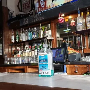 a bar with liquor bottles