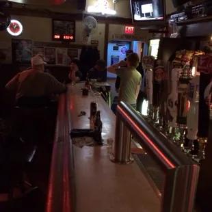 people sitting at the bar