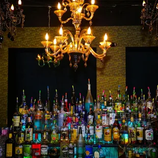 a bar filled with liquor bottles