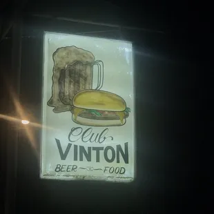 a beer and sandwich sign