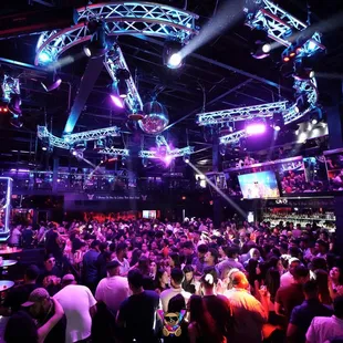 a crowd of people at a nightclub