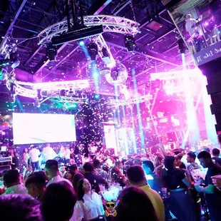 a crowd of people at a nightclub