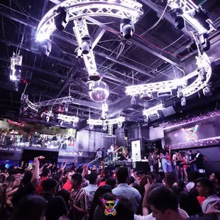 a large crowd of people at a nightclub