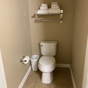 Toilet is separate from the sink in the master bedroom