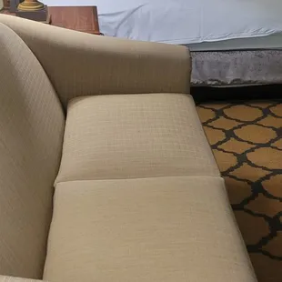 Bed and Sofa in Studio Room