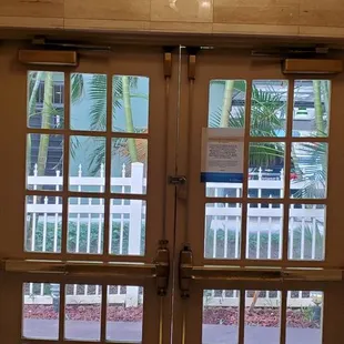 Exit in the lobby which is now locked with a padlock. Violation of Hawaii, Honolulu County, and OSHA regulations.