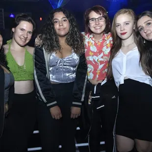 a group of young women posing for a picture