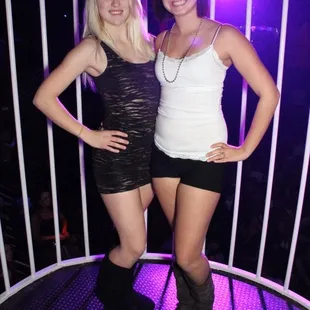 two women posing for the camera