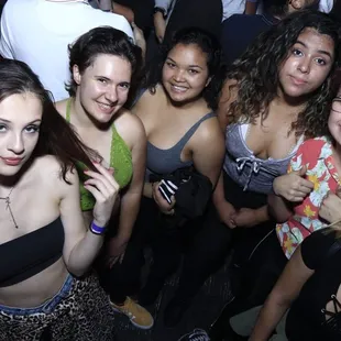 a group of young women posing for a picture