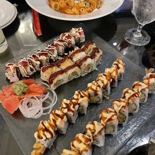 a variety of sushi and rolls