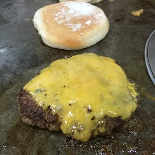 80/20 from the local butcher topped with our special NY sharp cheddar