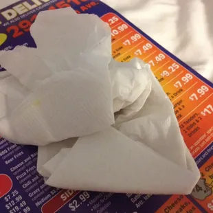 The single wet and already dirty napkin they packed with my order.