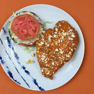 a sandwich and tomato