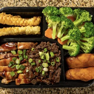 a bento box of food