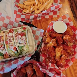 Wings, fries, and tacos. Had fried asparagus and fried cauliflower for apps.