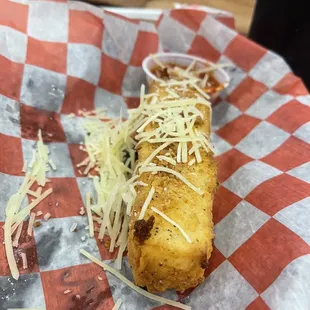 a cheesy bread roll with cheese