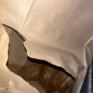 Thai iced tea spilled all over the delivery bag due to being packaged poorly