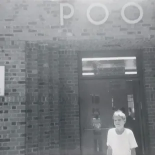 My brother in front of Clunie Pool circa 1968.  Notice the price.   40 cents for adults and .15 cents for children.