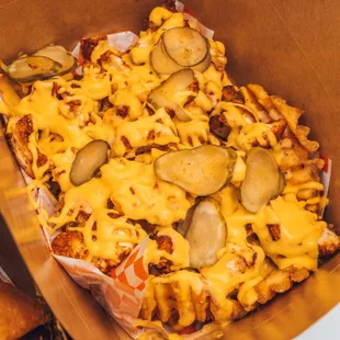 You&apos;ve never had loaded fries like this before! Enjoy our loaded cheese fries with pickles &amp; chicken tender pieces.