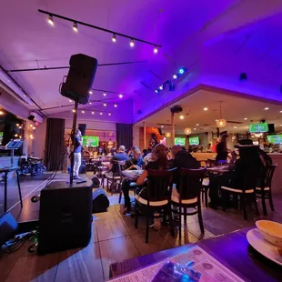 a crowd of people sitting at tables