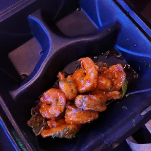 a tray of food with shrimp