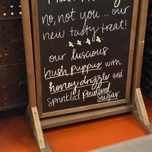 a chalk board with a menu on it