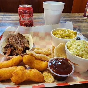 Tray of the beef brisket with corn and butter beans and cole slaw along with a Cheerwine. Yum!