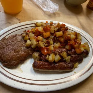 Two types of sausage with fried potatoes