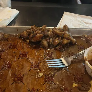 Vile pile of fat on brisket this brisket eater has never seen served anywhere in the US.